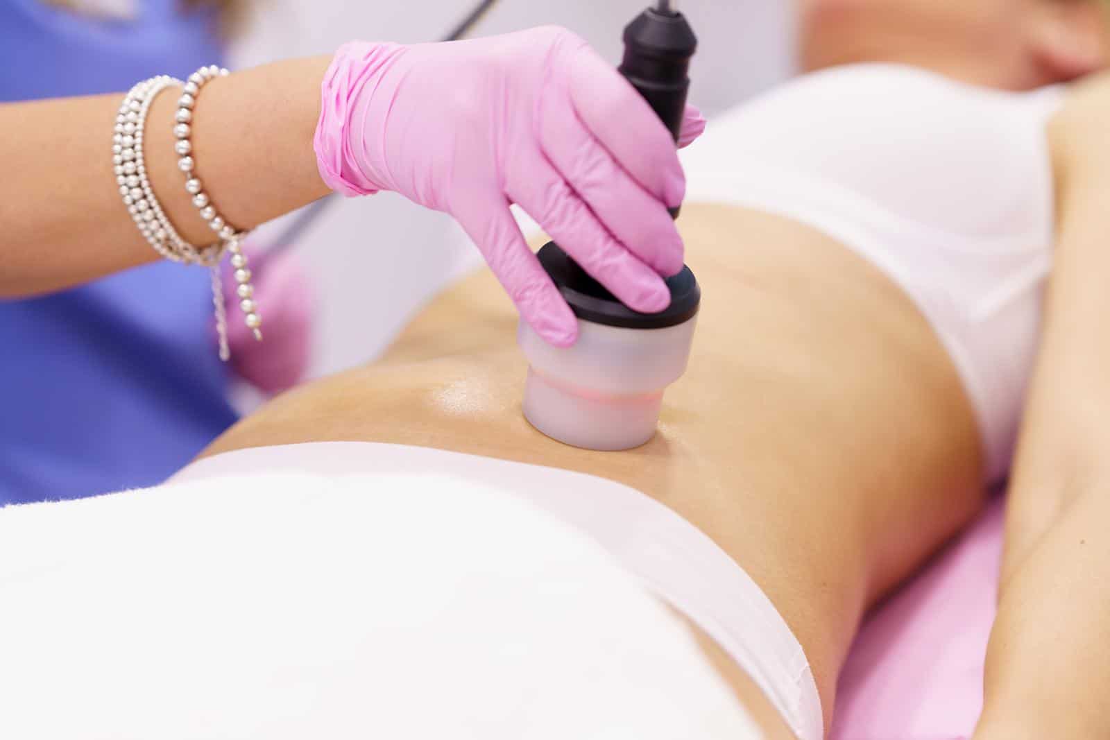 40241724 woman receiving anti cellulite treatment with radiofrequency machine in a beauty center