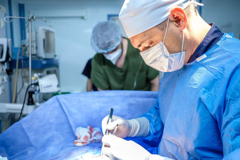 surgeon performs surgery