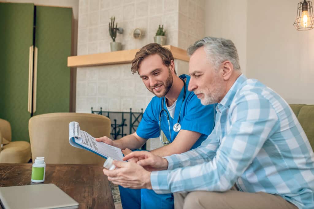 cheerful physician serious man talking about dietary supplements